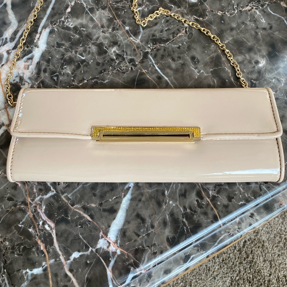 Tan clutch with chain shoulder strap